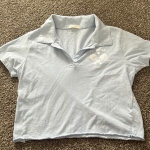 blue cropped tennis society tee